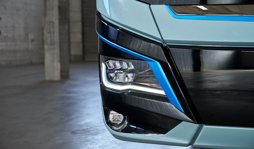 MAN Lion s Coach E on far